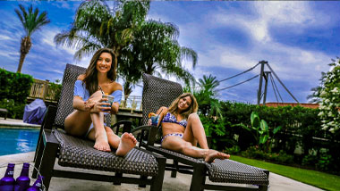 Ladies lounging near pool