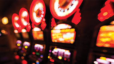 row of blurred slot machines