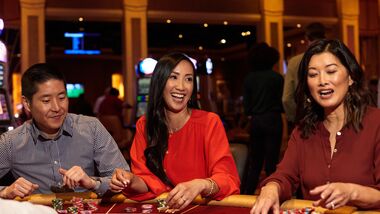 woman playing slot machine
